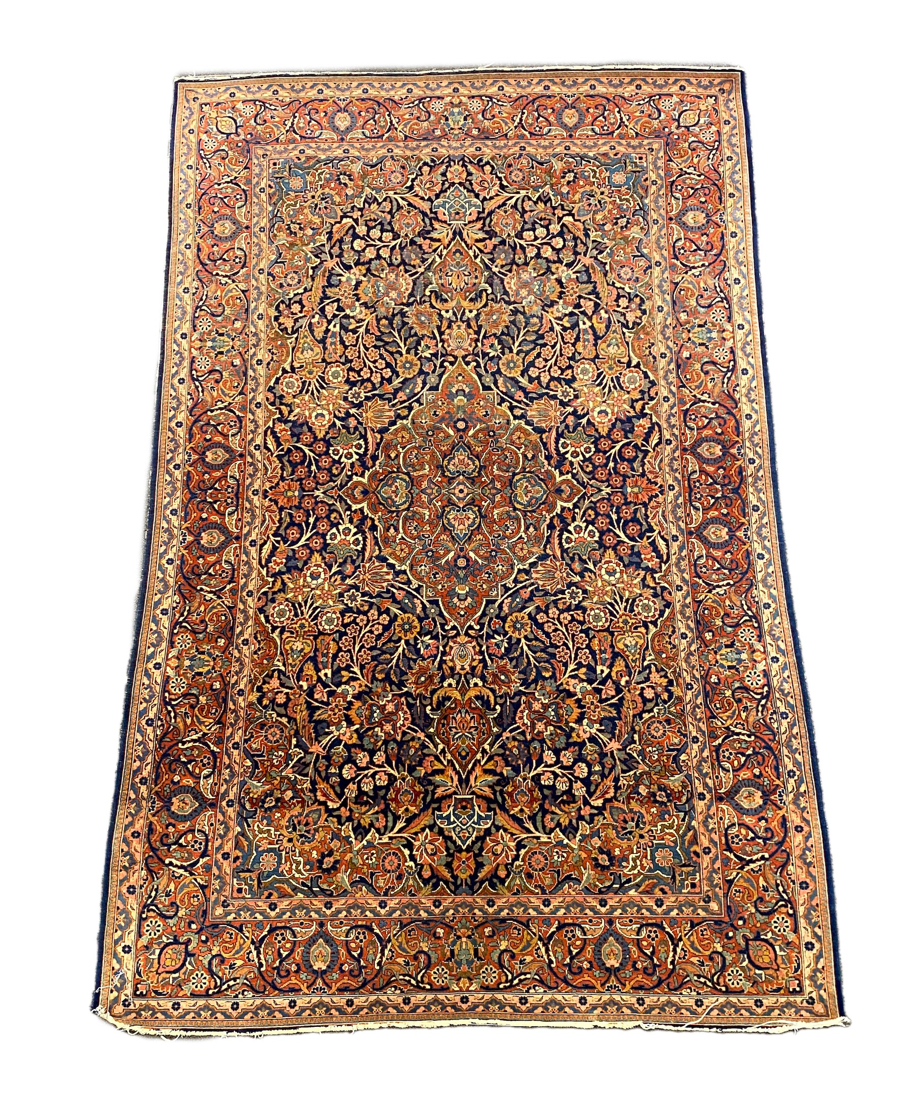 An early 20th century Kashan blue ground rug, 208cm x 134cm